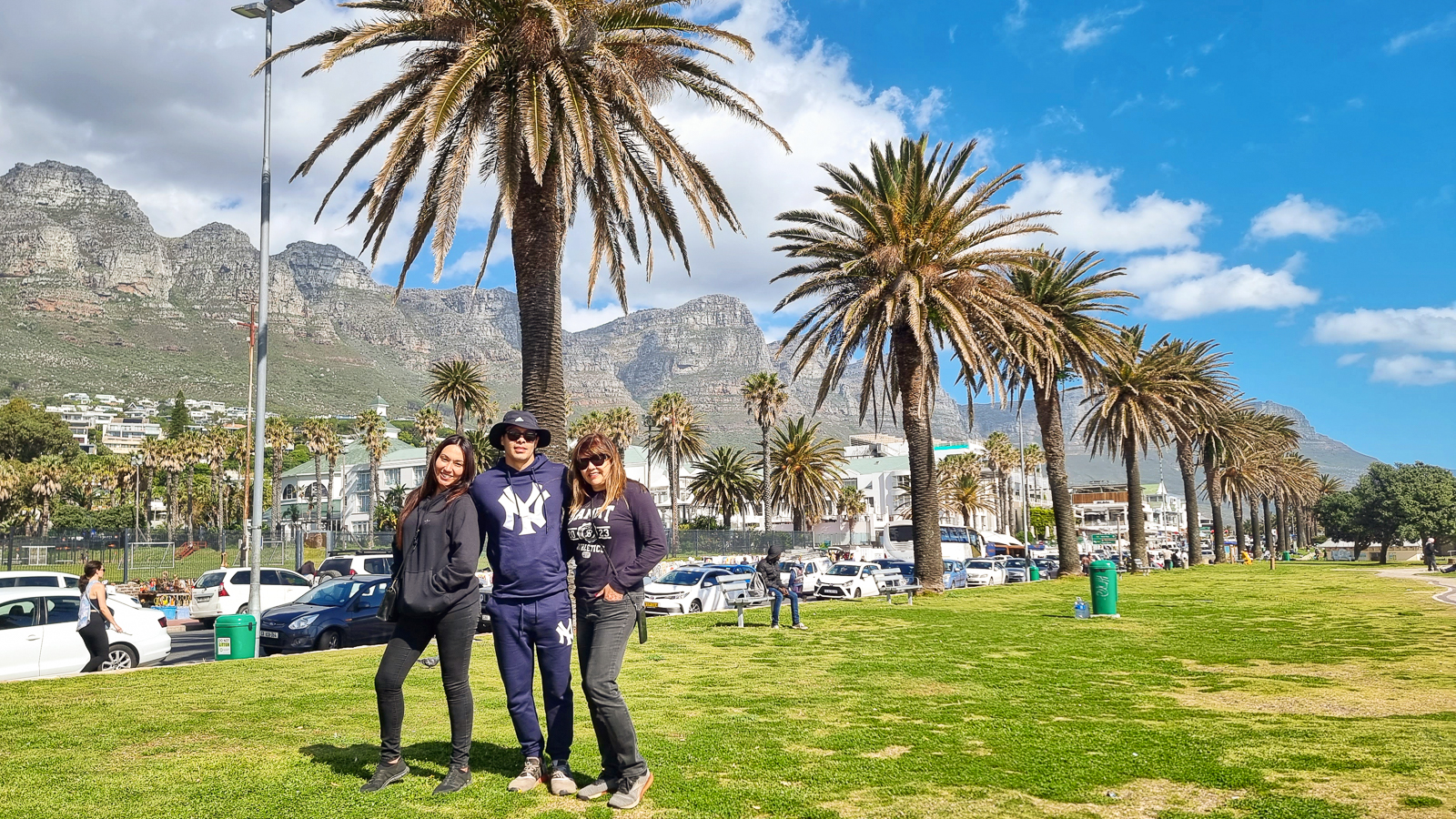 Cape Town Tour - Family enjoying the beaches, palm trees and mountain views